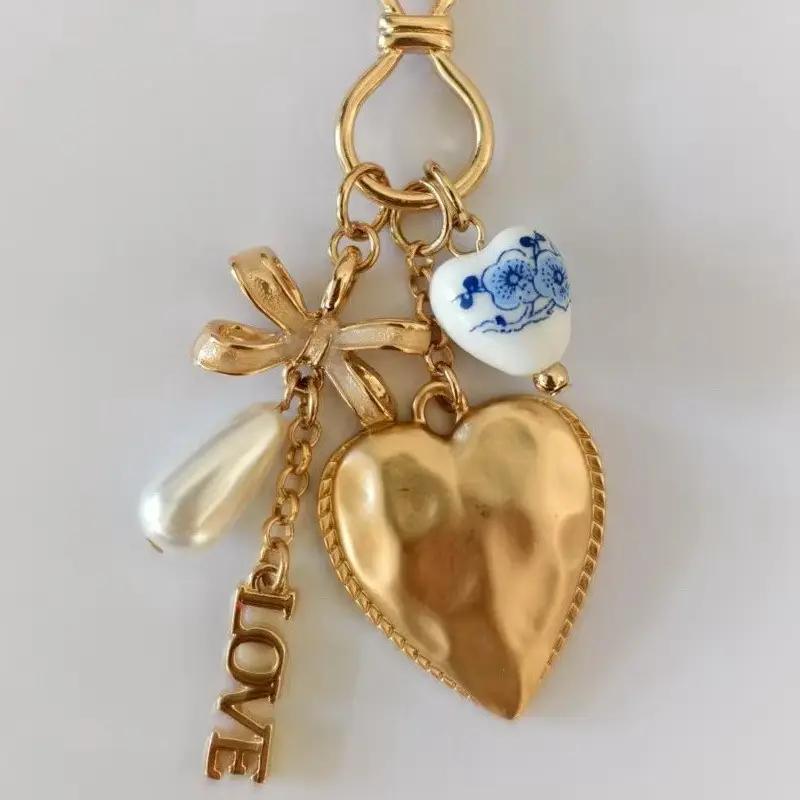 Porcelain Bow Heart Love Bag Charm