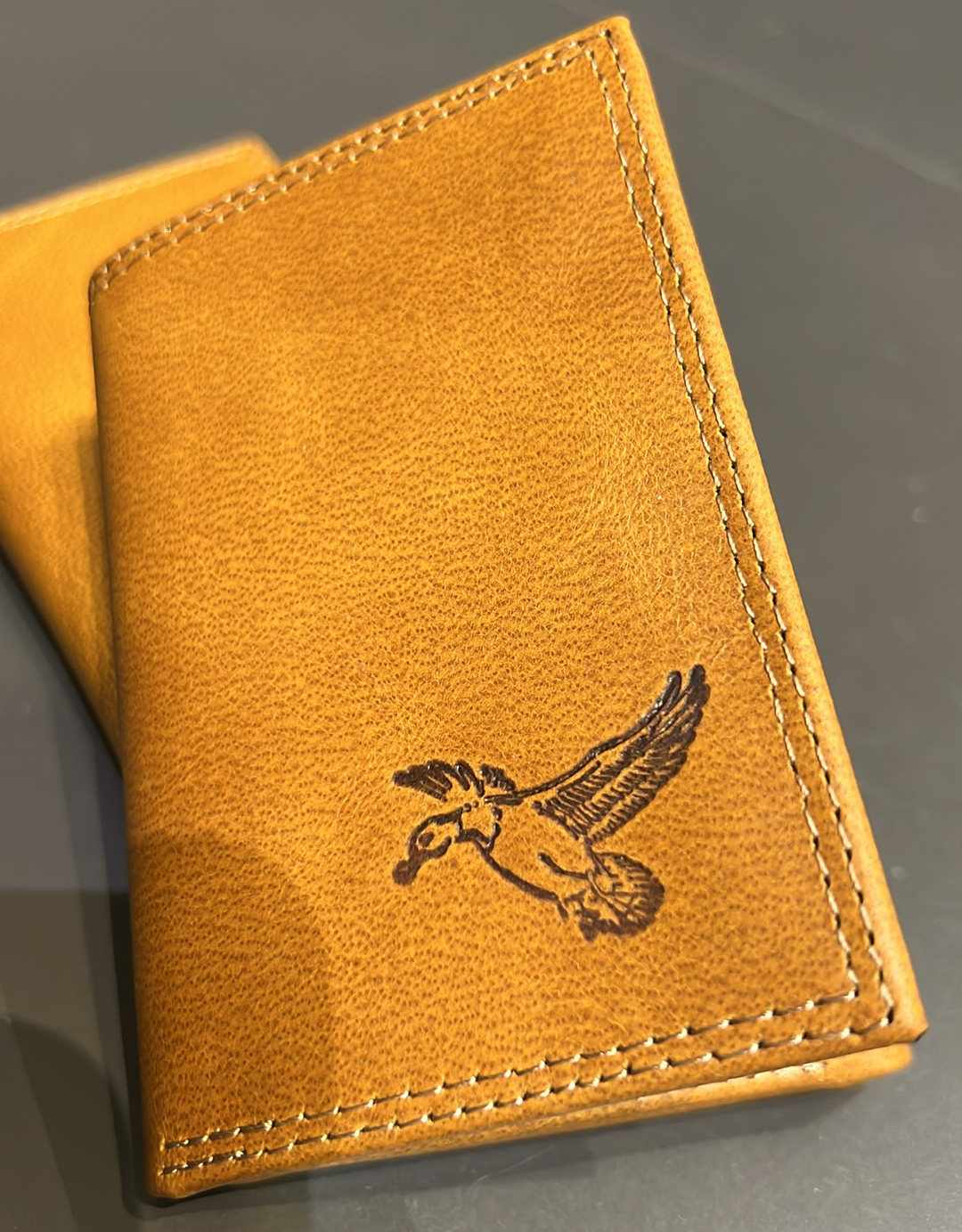 Tan Embossed Trifold Wallet