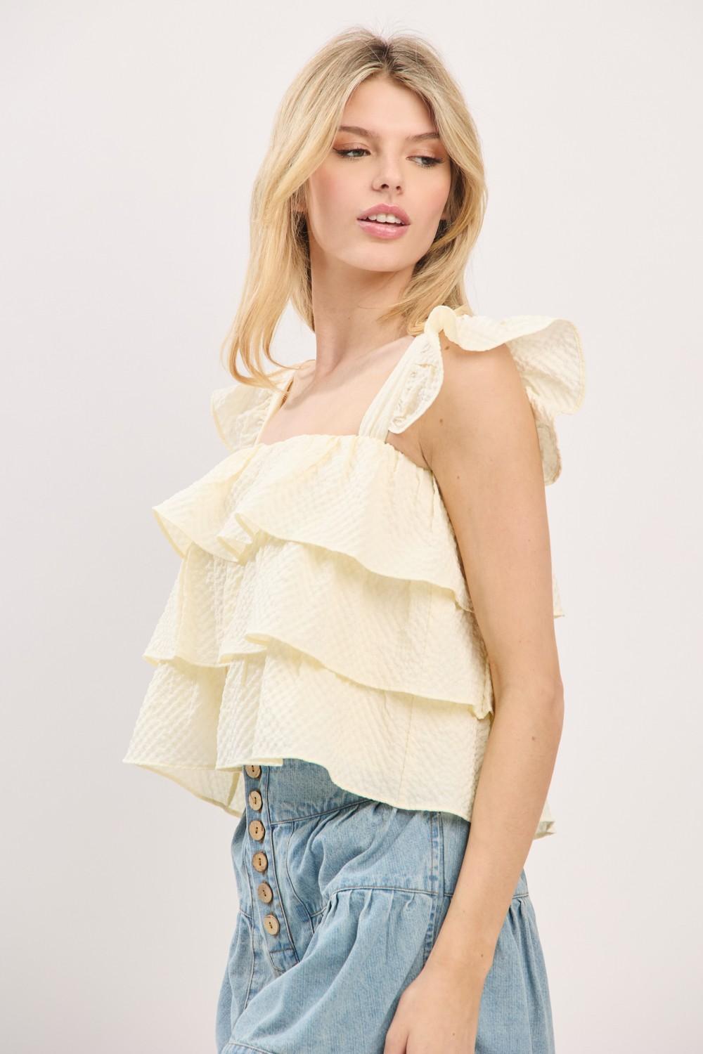 NATURAL RUFFLE SLEEVELESS TIERED TOP