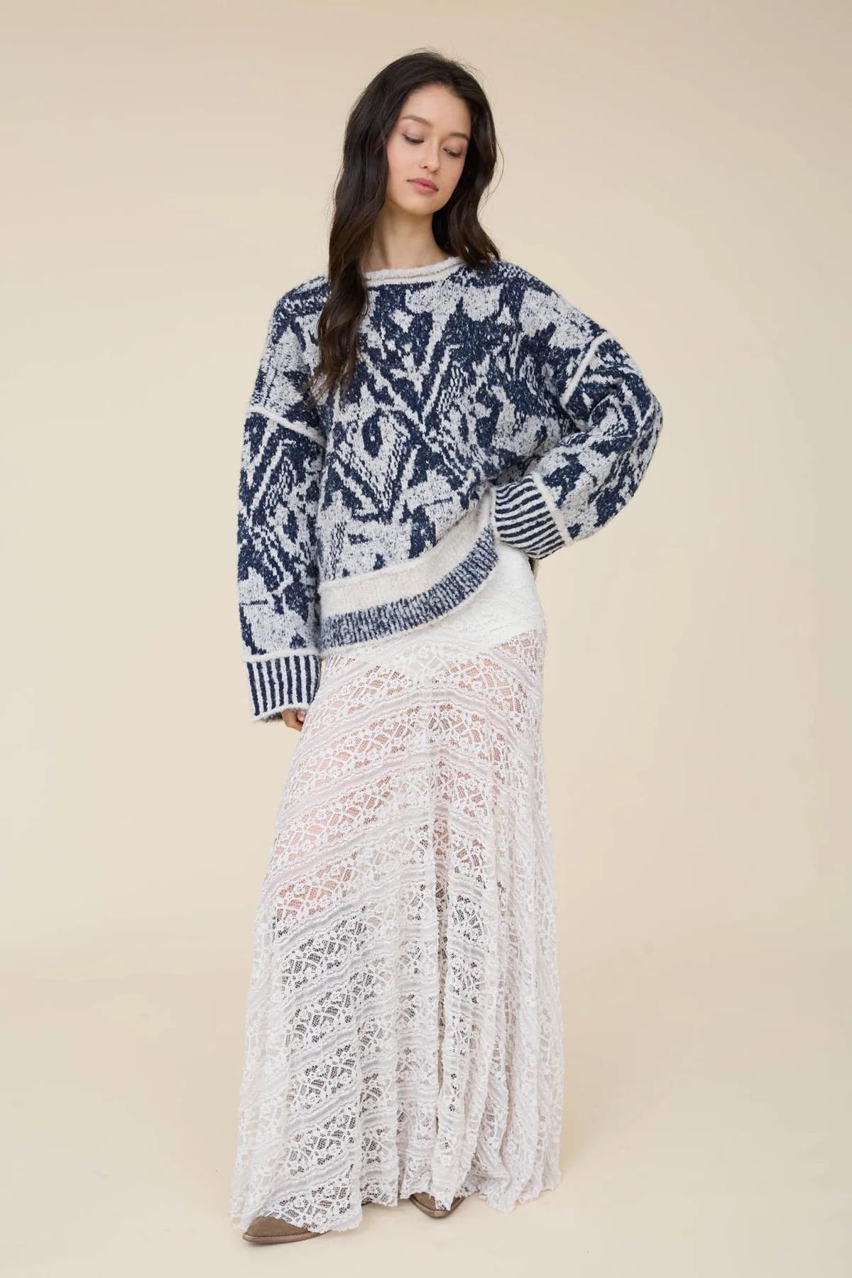NAVY HEATHERED GEOMETRIC PRINT RAW EDGE KNIT SWEATER