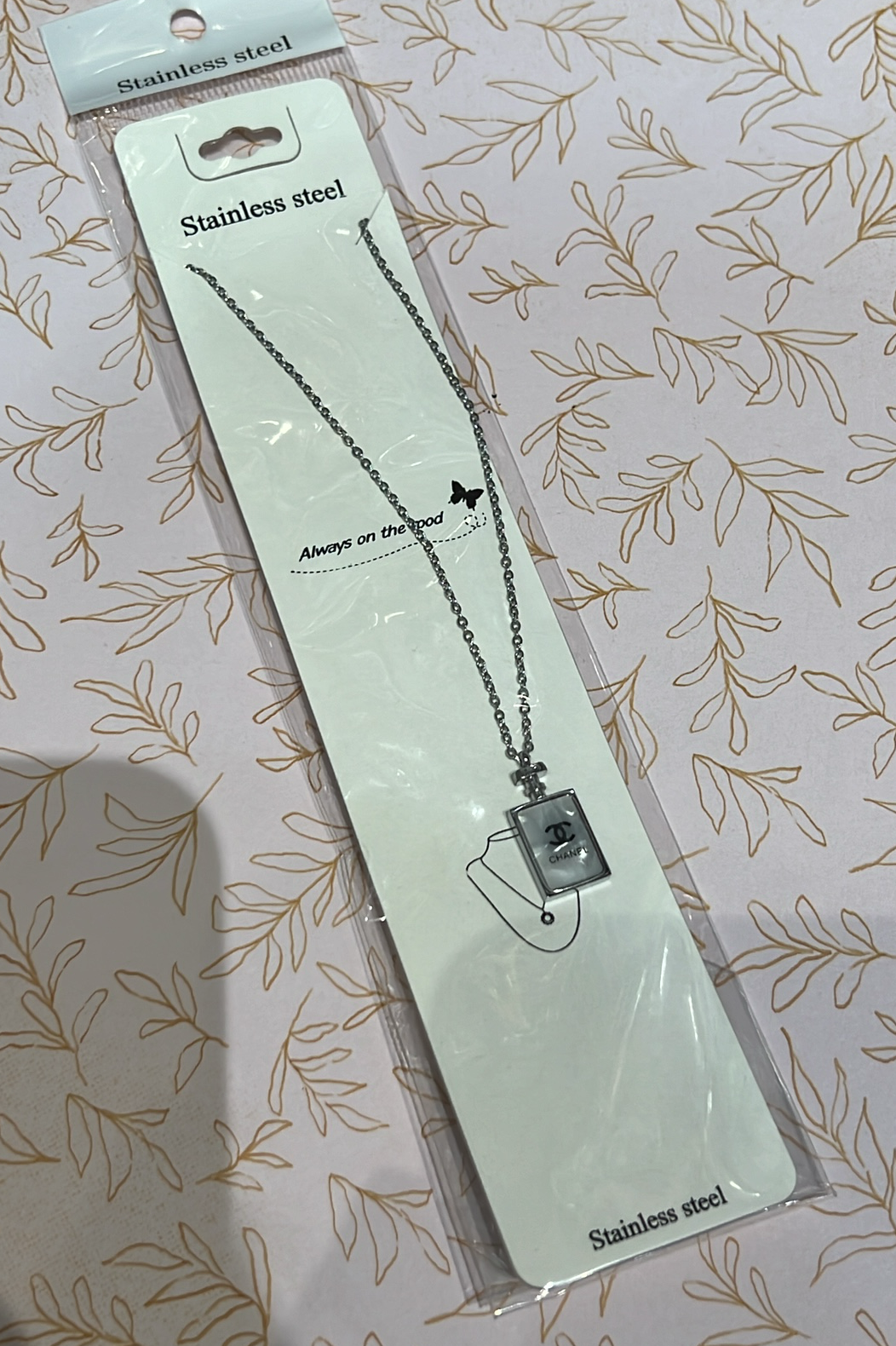 Chanel Bottle Necklace