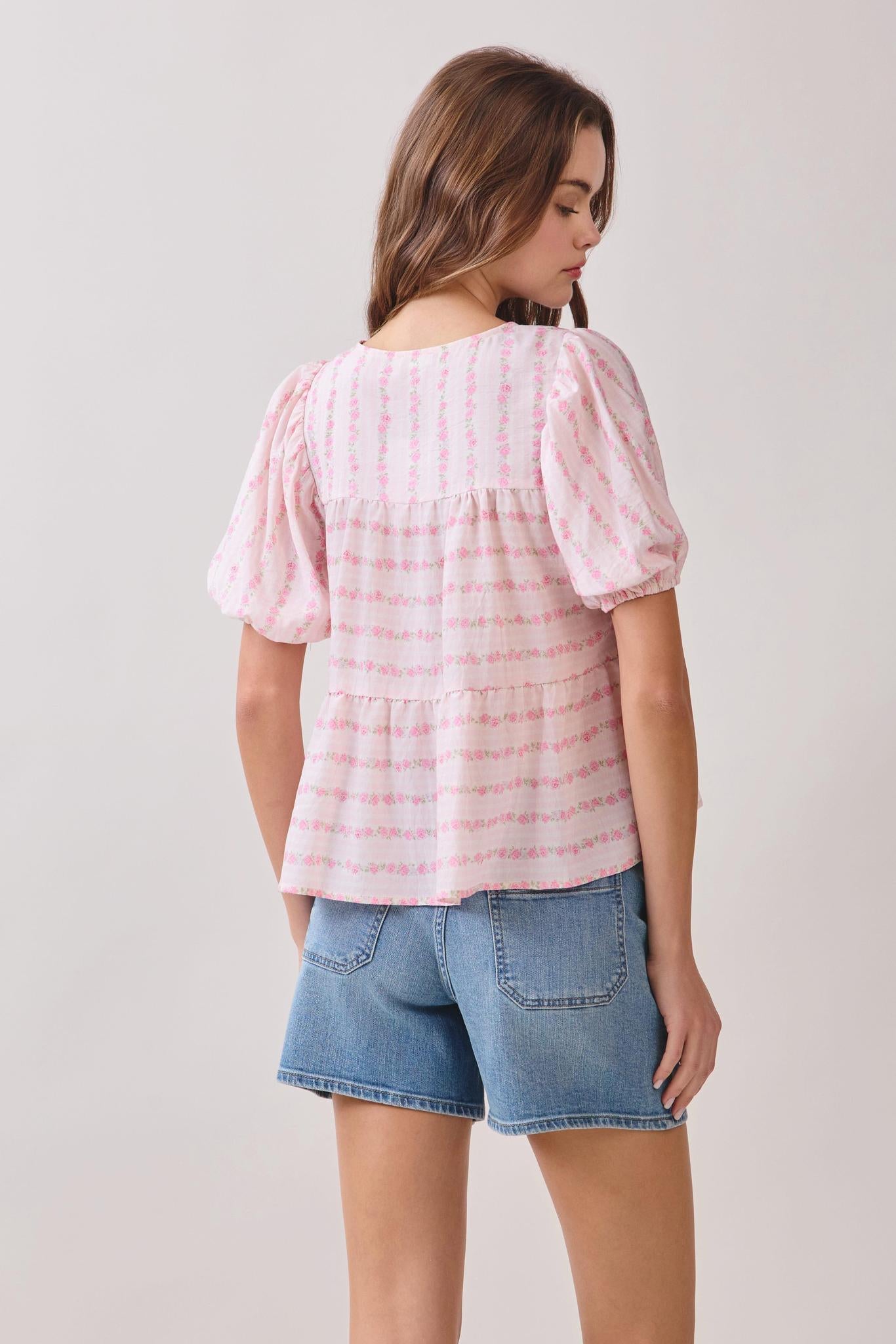 Floral Print Front Tie Neckline Peplum Hem Top