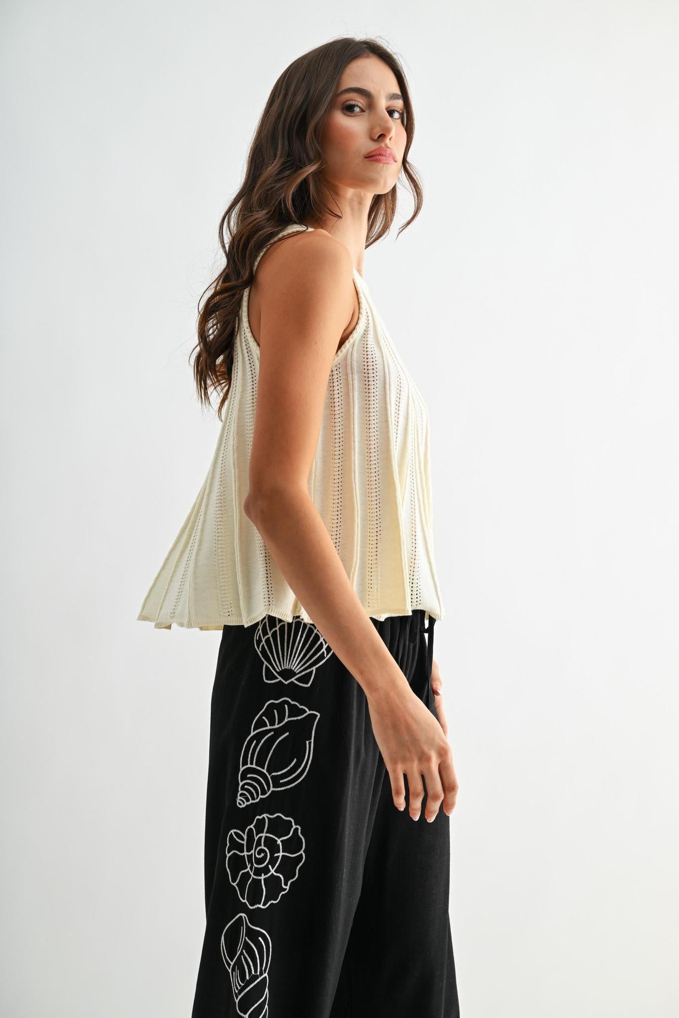 Sleeveless Knit Top With Flared Hem