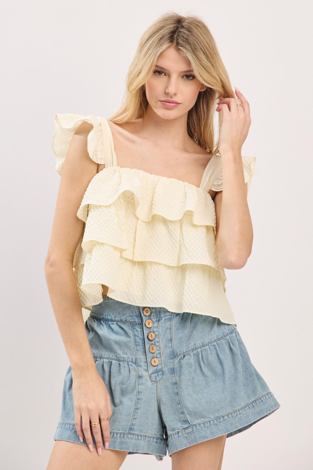 NATURAL RUFFLE SLEEVELESS TIERED TOP