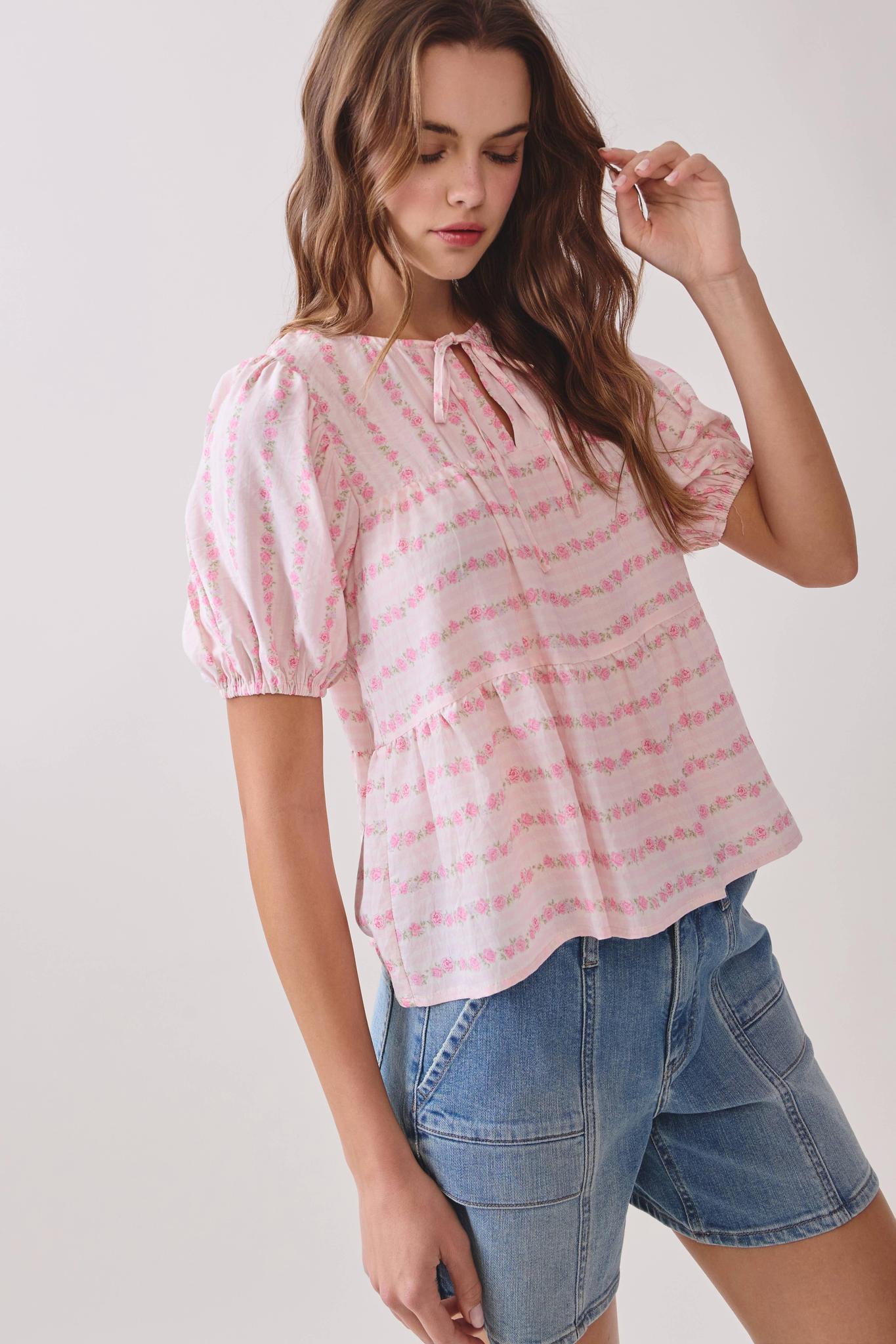 Floral Print Front Tie Neckline Peplum Hem Top