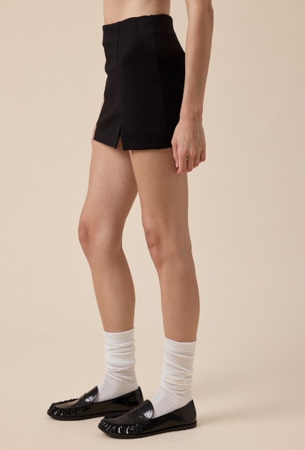Black One-side Slit Shorts Underneath Mini Skirt