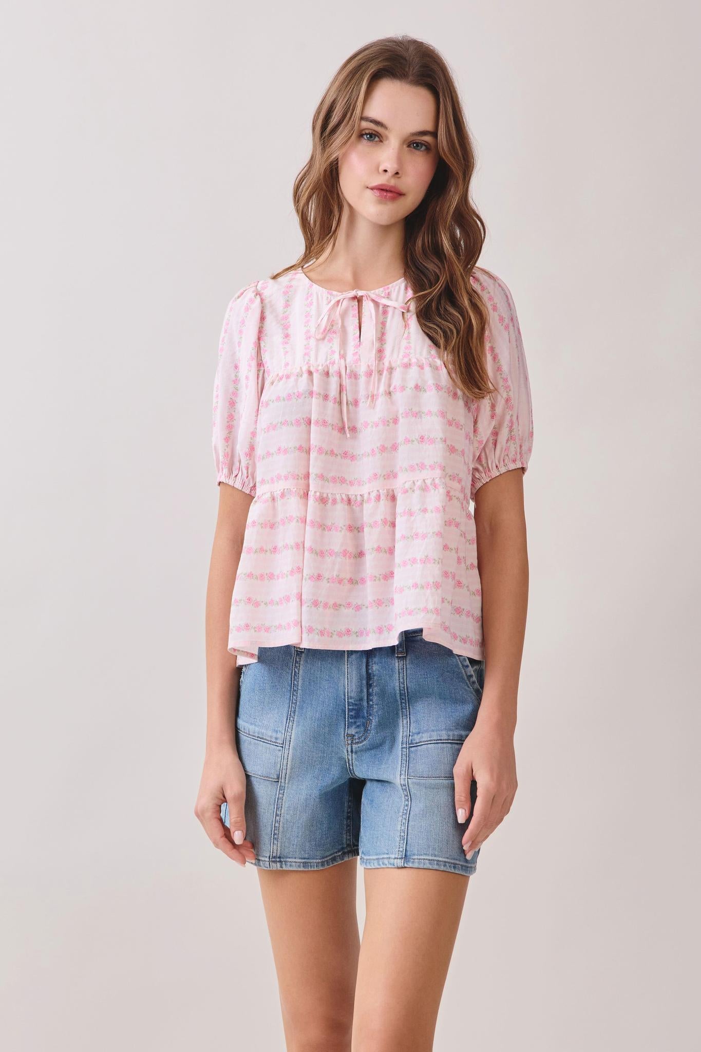 Floral Print Front Tie Neckline Peplum Hem Top