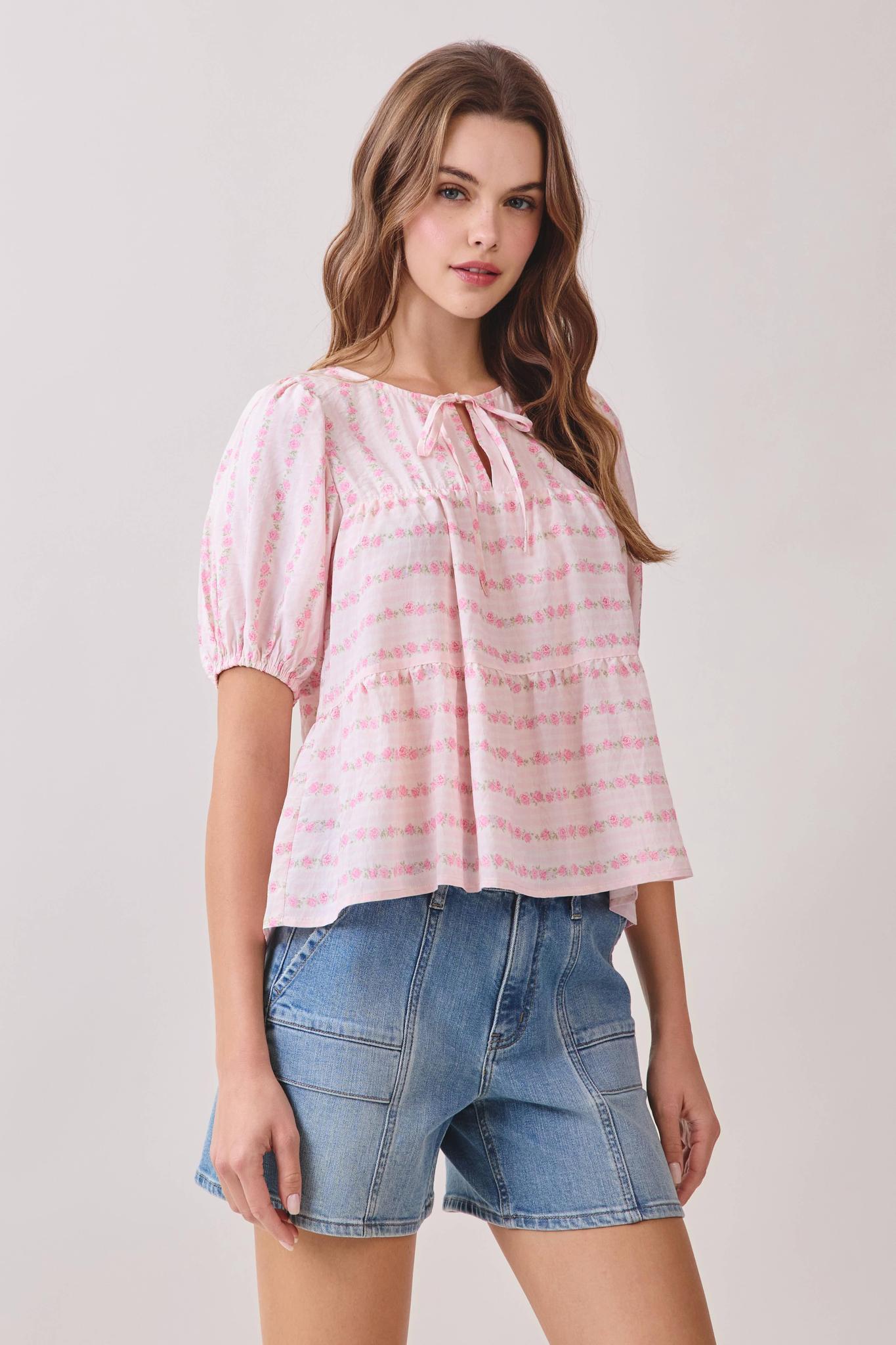 Floral Print Front Tie Neckline Peplum Hem Top