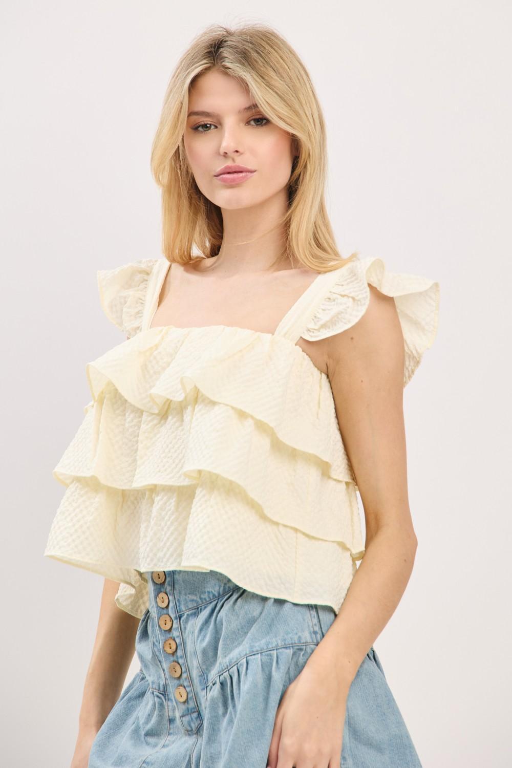 NATURAL RUFFLE SLEEVELESS TIERED TOP