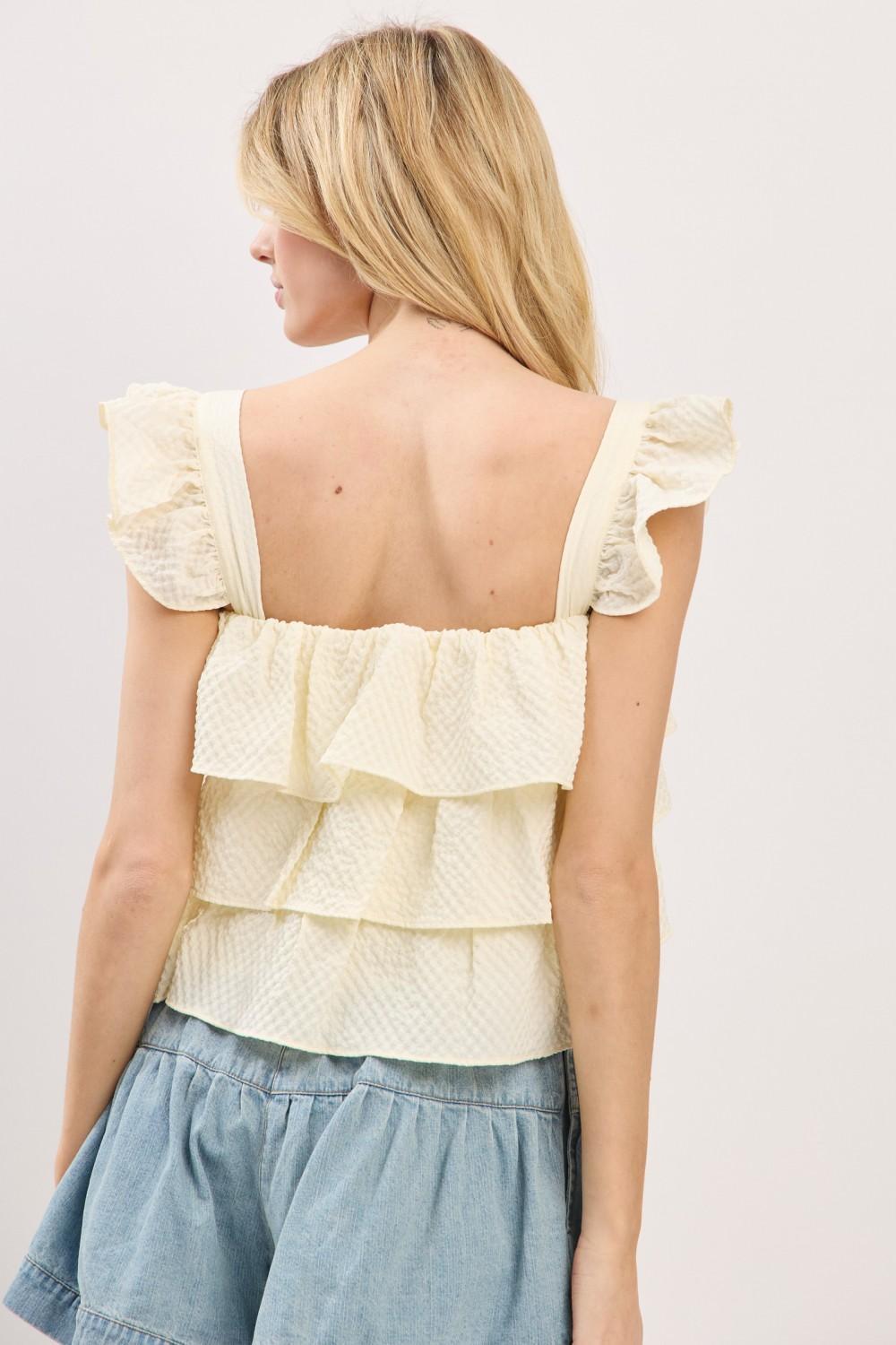 NATURAL RUFFLE SLEEVELESS TIERED TOP