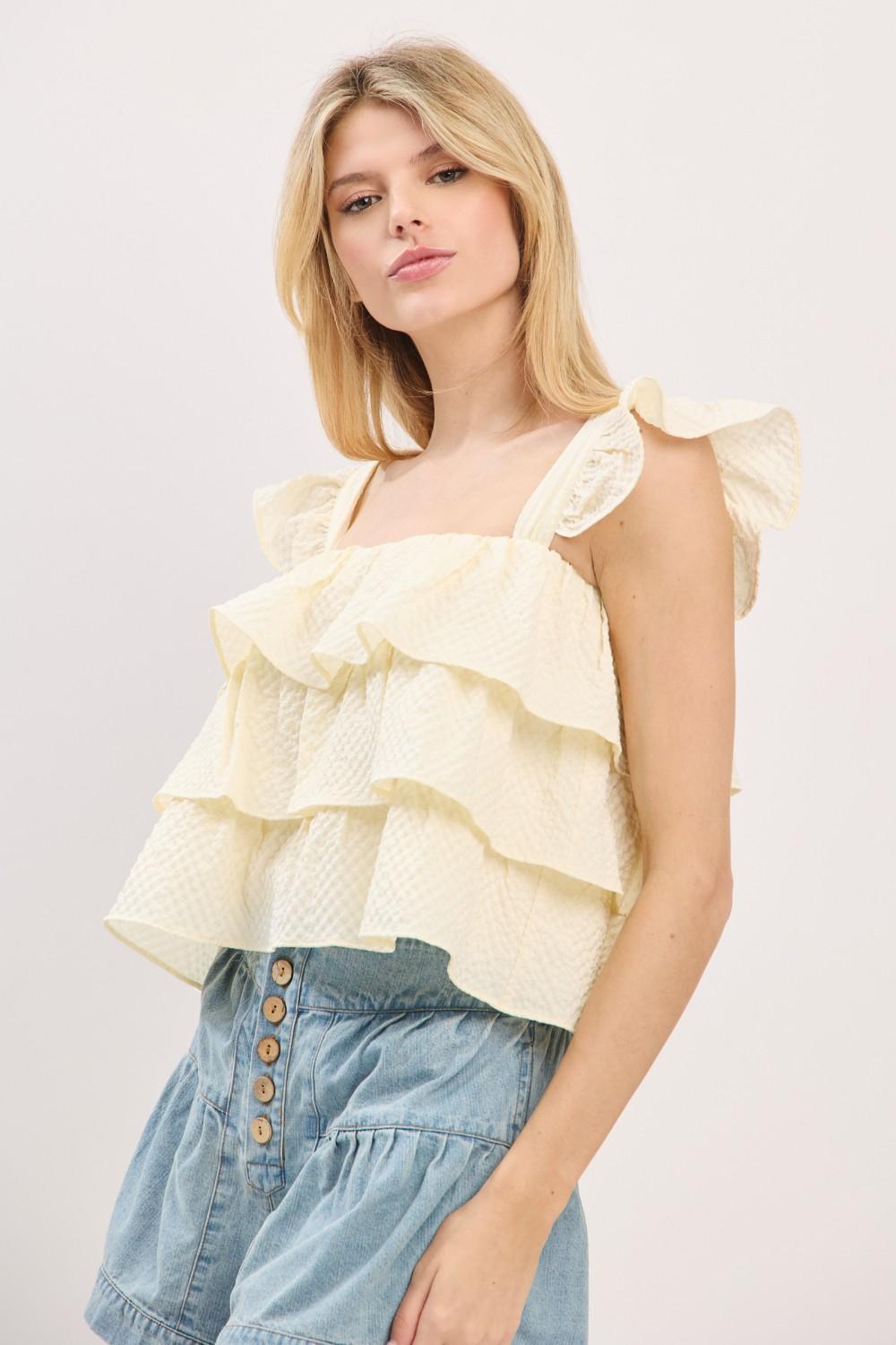 NATURAL RUFFLE SLEEVELESS TIERED TOP